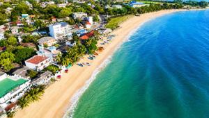 an aerial view of a beach and the ocean at Dutch Bay Villa - Trincomalee in Trincomalee