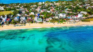 an aerial view of a beach with a group of people at Dutch Bay Villa - Trincomalee in Trincomalee +62 photos