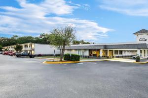 an empty parking lot in front of a building at Super 8 by Wyndham Gaffney in Gaffney