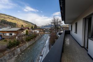 a view of a river from a building at Alpen Lodge Kirchberg in Kirchberg in Tirol