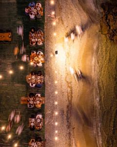 an overhead view of a group of people with lights at Arz'Urla Restaurant & Otel in Urla