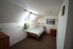 En eller flere senge i et værelse på Y Felin - The Mill