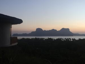 a house with a view of the water and mountains at Atalaya Resort El Nido in El Nido