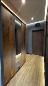 an empty room with a closet and a door at MitProt Panorama Bay 2 Studio 93 in Sveti Vlas +12 photos