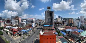 a city with tall buildings and a street at SENNA SUNSHINE INTERNATIONAL HOTEL in Sihanoukville