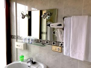 Koupelna v ubytování Hostal Concejo