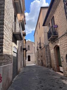 an empty alley in an old stone building at Pasitea in Potenza
