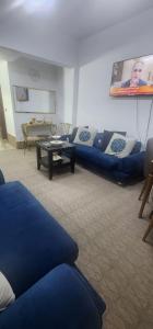a living room with a couch and a table at الاردن - جرش in Jerash