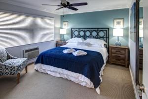 Postel nebo postele na pokoji v ubytování May-Dee Suites in Florida