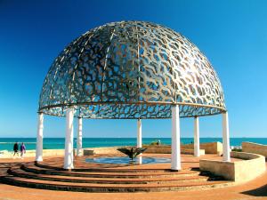 a metal structure sitting on top of a beach at Geraldton Luxury Vacation Home with free Streaming in Geraldton