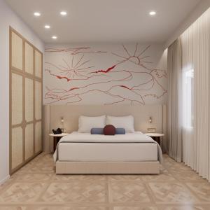 a bedroom with a bed and a painting on the wall at The Character in Athens