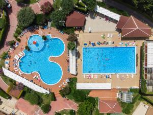 an overhead view of a swimming pool in a resort at Club Residence Tropea Pace in Tropea