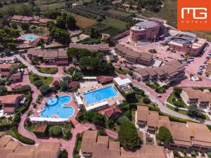 an aerial view of a resort with a pool at Club Residence Tropea Pace in Tropea