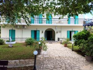 a view of the front of the building at Maritsas Apartments in Roda