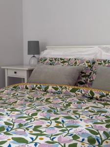a bed with two pillows on it in a bedroom at 24 Old Scapa Road in Kirkwall