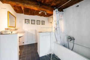 a bathroom with a shower and a sink and a tub at Assisi Countryhouse in Assisi +53 photos
