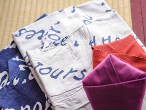 a pile of cloths with a napkin with the words soups at Hotel Hagoromo in Shizuoka