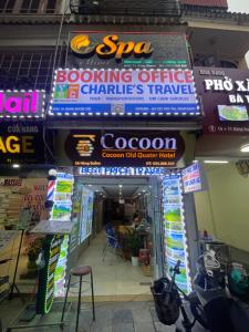 a store with signs on the front of it at Coco0n Old Quarter Hotel in Hanoi