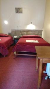 Ένα ή περισσότερα κρεβάτια σε δωμάτιο στο Casa Grande Colonial Palace