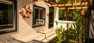 a porch of a house with pumpkins on the wall at Alimandi Villa in Klapmuts