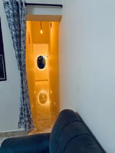 a room with a room with a door and a window at Wee Homes in Bangalore