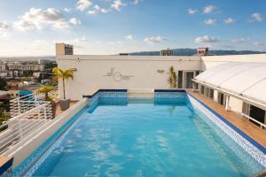 a swimming pool on the roof of a building at The Nook in Kingston
