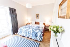 Postel nebo postele na pokoji v ubytování Hotel Fredensborg Store Kro