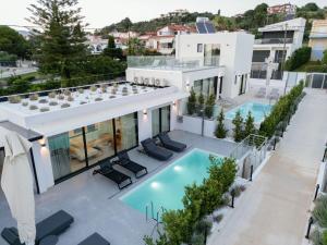 an aerial view of a house with a swimming pool at Sole Azzurro Villas in Kanali