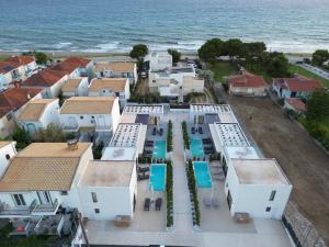 an aerial view of a house near the ocean at Sole Azzurro Villas in Kanali