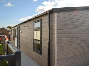 a side view of a modular building with windows at Atmospheric in Patrington