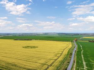 an aerial view of a field and a road at The Watertower in Marlborough