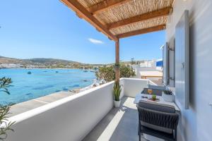 a balcony with a view of the ocean at Michalakis Seaside Suites in Pollonia