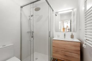 a bathroom with a shower and a sink at La casa del Pan in Málaga +12 photos