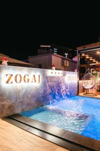 a pool on a ship with a water slide at Erik Studio in Ksamil