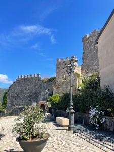 a street light in front of a castle at Terrazza sul Borgo in Camerota