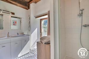 a bathroom with a shower and a sink at Le gué de brocéliande in Plélan-le-Grand +28 photos