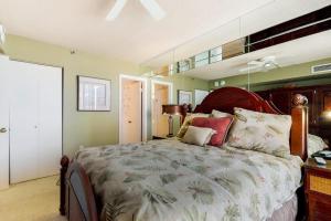 a bedroom with a large bed in a room at Sea Colony oceanfront 4th floor condo with elevator in Bethany Beach +38 photos