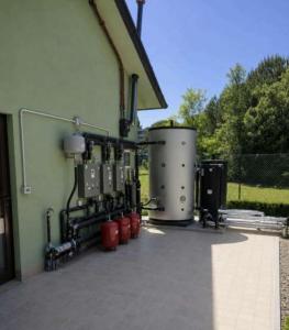 a building with two tanks on the side of it at Hotel Venus in Milano Marittima