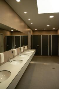 a row of sinks in a public bathroom at Munich Oktoberfest Central Camping Village in Munich +49 photos