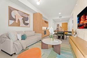 a living room with a couch and a table at 1Bd Top Location Downtown Miami in Miami