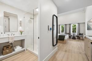 a bathroom with a shower and a bedroom at Casa Iglesia in Santa Barbara +291 photos