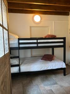 a bunk bed room with two bunk beds at Maison Camille in Hotton