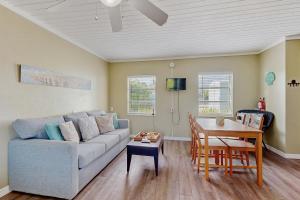 a living room with a couch and a table at CK03 Fisherman's Retreat in Conch Key