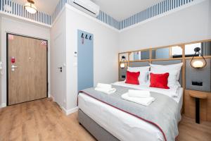 Llit o llits en una habitació de Hello Sopot 128 fotos més