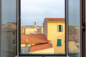 a view from a window of a building at Verdi 185 by Pleiades Home in Livorno