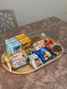 a tray of snacks and other food on a table at Binario104 in Naples