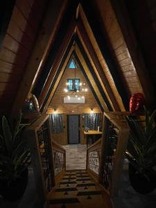 a hallway of a house with a vaulted ceiling at Hidden Cabins Puerto Rico in Comerio