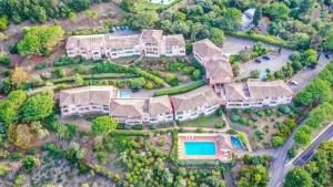 an aerial view of a house with a yard at Alta Suarella in Saint-Florent