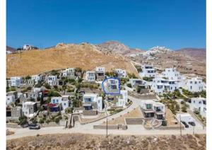 an aerial view of a village with white houses at Flora's House in Livadakia