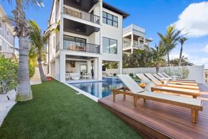 an image of a house with a swimming pool at Big Nauti in Bradenton Beach